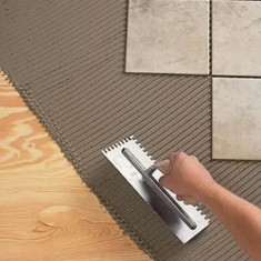 Как грамотно положить плитку на деревянный пол